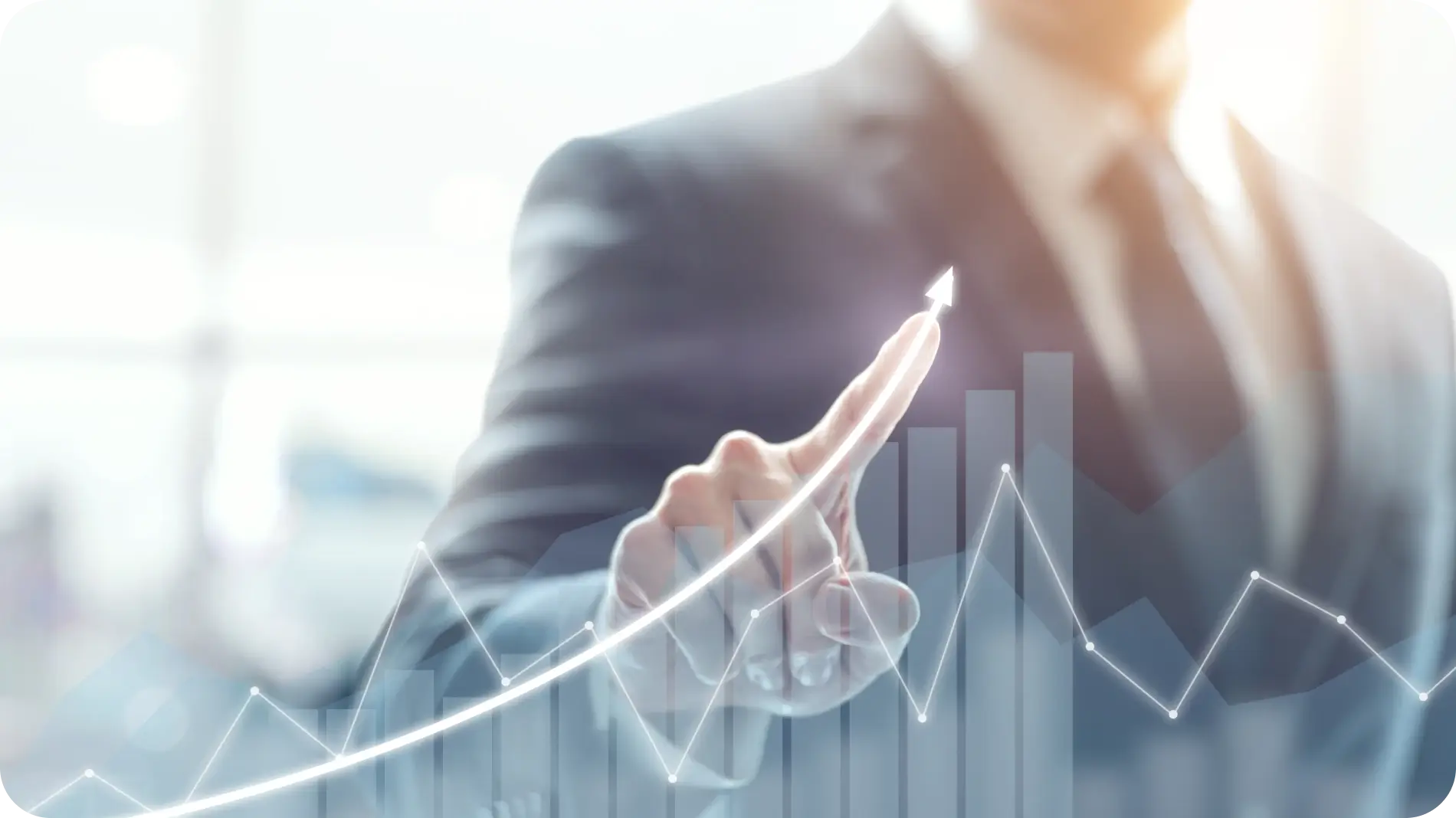 Business man drawing a graph with his finger.